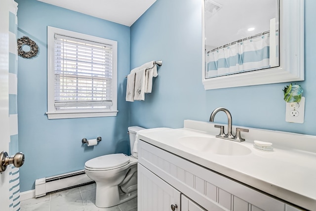 bathroom featuring vanity, toilet, and a baseboard radiator