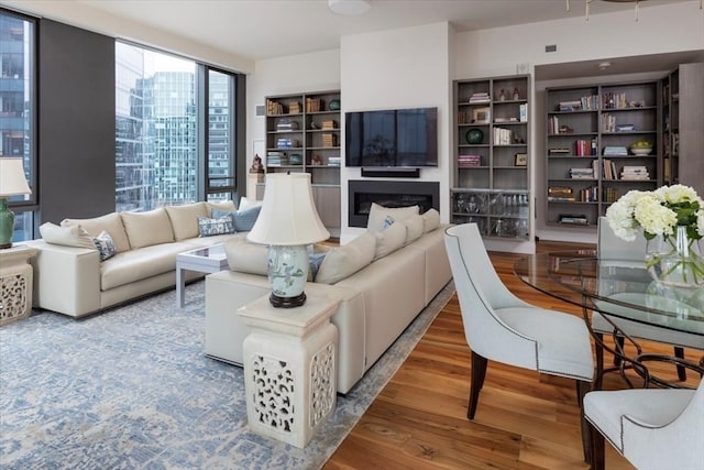 living room with light hardwood / wood-style floors