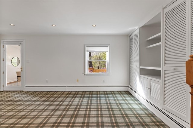 interior space featuring carpet floors, baseboard heating, a baseboard heating unit, and recessed lighting