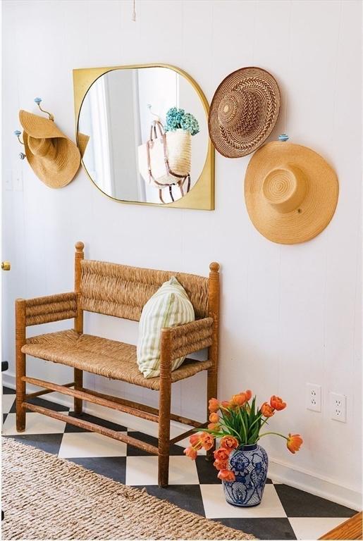 mudroom with tile patterned floors and baseboards