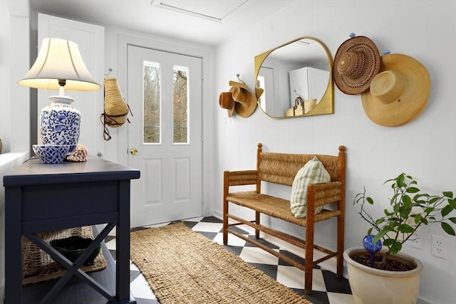 mudroom with tile patterned floors