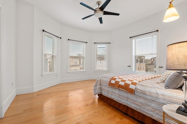 714 E 4th St Unit 3, Boston, MA 02127 - bedroom with wood finished floors, baseboards, and a ceiling fan