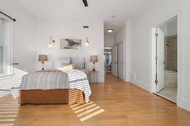 714 E 4th St Unit 3, Boston, MA 02127 - bedroom featuring wood finished floors, baseboards, and a closet