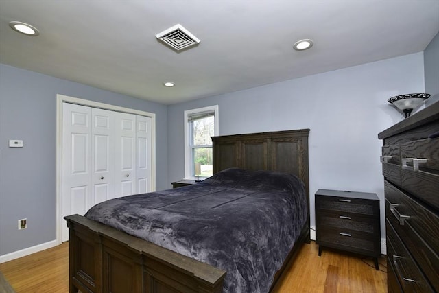 231 Mattapoisett Rd, Acushnet, MA 02743 - bedroom featuring visible vents, a closet, baseboards, recessed lighting, and light wood-style flooring