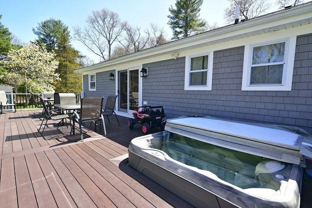 231 Mattapoisett Rd, Acushnet, MA 02743 - deck with a covered hot tub and outdoor dining space