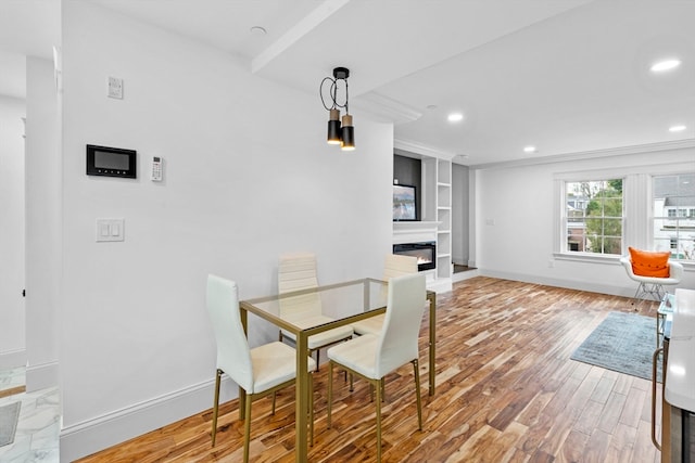 dining room with wood-type flooring