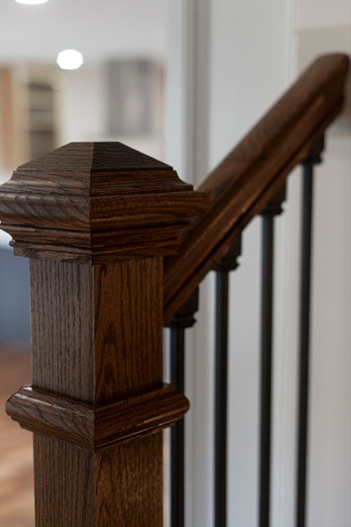 stairs with wood-type flooring