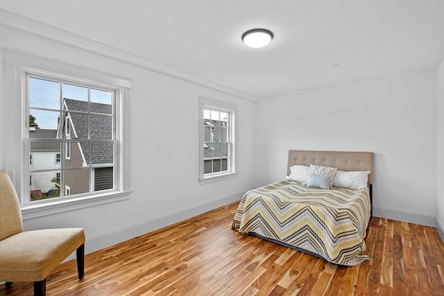 bedroom featuring hardwood / wood-style floors