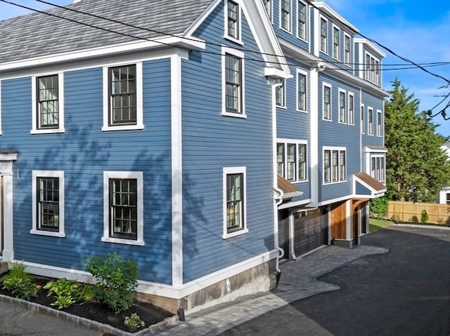 view of property exterior featuring a garage