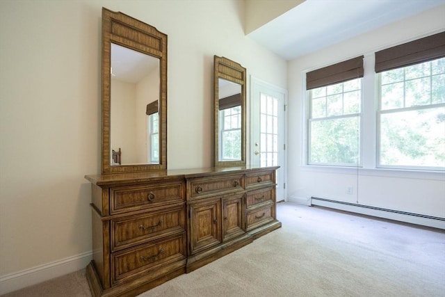 116 Spring Mdw Unit 116, Hanover, MA 02339 - bedroom featuring light colored carpet, multiple windows, and baseboards