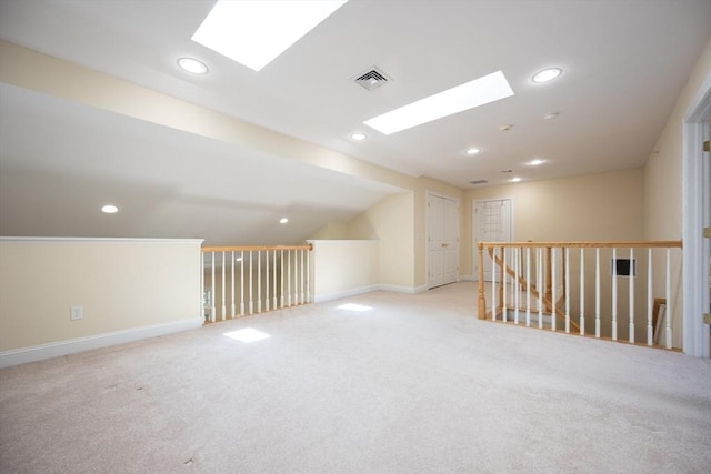 116 Spring Mdw Unit 116, Hanover, MA 02339 - bonus room with a skylight, light colored carpet, recessed lighting, baseboards, and vaulted ceiling