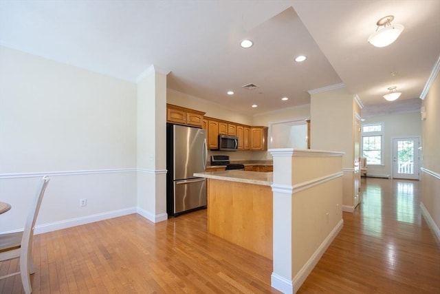 116 Spring Mdw Unit 116, Hanover, MA 02339 - kitchen featuring stainless steel appliances, crown molding, light wood finished floors, baseboards, and recessed lighting