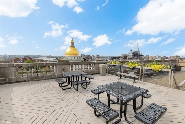 wooden deck featuring a city view