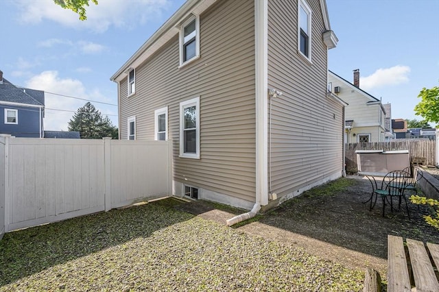 view of property exterior featuring a fenced backyard