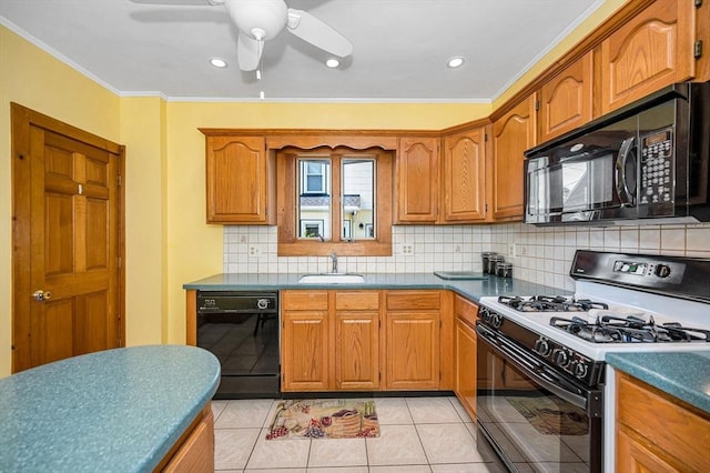 kitchen with black appliances, a sink, tasteful backsplash, brown cabinetry, and ornamental molding