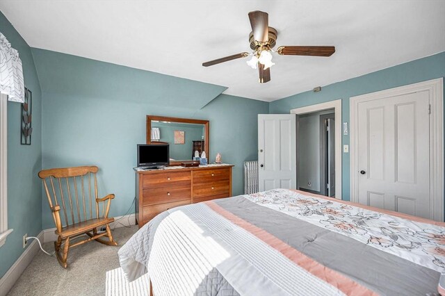 bedroom featuring carpet, baseboards, and ceiling fan