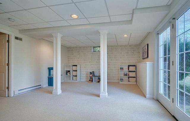 below grade area with recessed lighting, visible vents, a baseboard heating unit, light carpet, and a drop ceiling