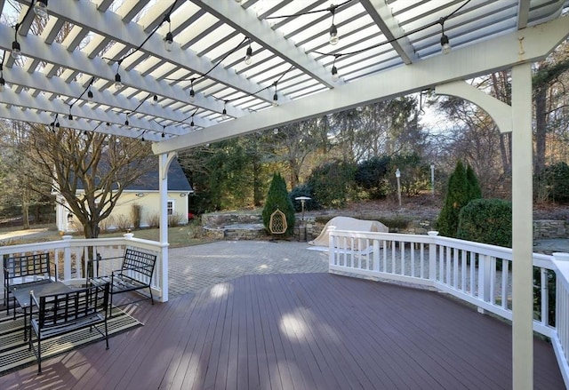 wooden terrace with a pergola