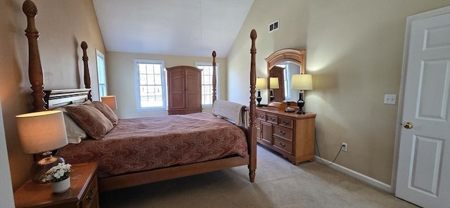 bedroom with visible vents, baseboards, vaulted ceiling, and light carpet