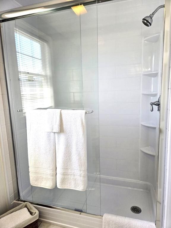 full bath featuring a stall shower