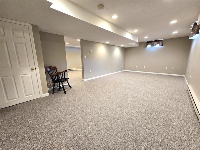 finished below grade area featuring recessed lighting, carpet, and baseboards
