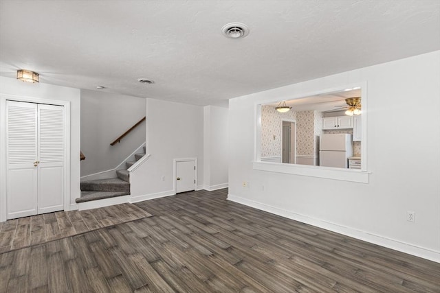 10 Enterprise St Unit 2, Duxbury, MA 02332 - unfurnished living room featuring dark wood-type flooring, stairway, and ceiling fan
