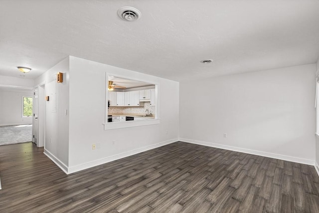 10 Enterprise St Unit 2, Duxbury, MA 02332 - unfurnished living room featuring dark wood finished floors and ceiling fan