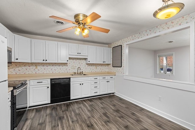 10 Enterprise St Unit 2, Duxbury, MA 02332 - kitchen with black dishwasher, stainless steel electric range oven, dark wood finished floors, white cabinetry, and wallpapered walls
