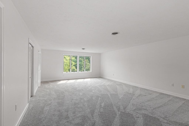 10 Enterprise St Unit 2, Duxbury, MA 02332 - empty room with light colored carpet and baseboards