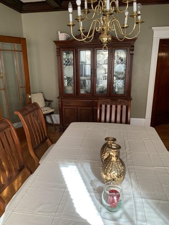 dining area featuring baseboards