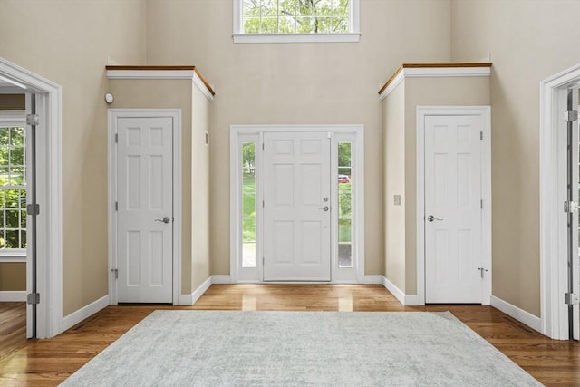 5 John Matthew Rd, Hopkinton, MA 01748 - foyer featuring a towering ceiling, wood finished floors, and healthy amount of natural light