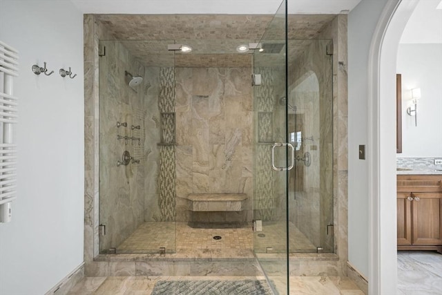 5 John Matthew Rd, Hopkinton, MA 01748 - full bathroom featuring vanity, a stall shower, a towel warmer, and marble finish flooring