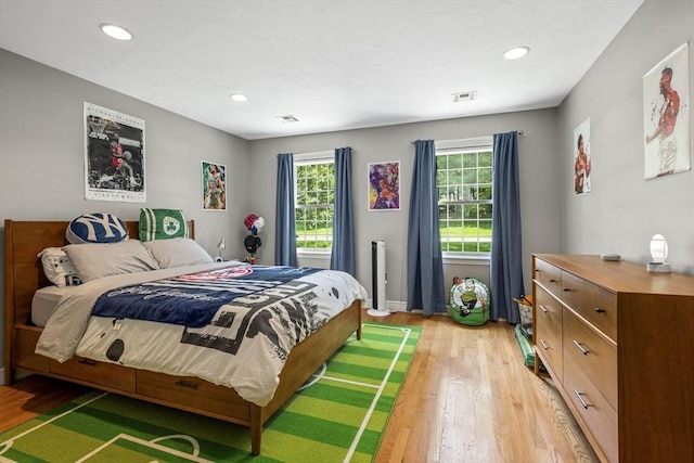 5 John Matthew Rd, Hopkinton, MA 01748 - bedroom with light wood-style flooring and recessed lighting