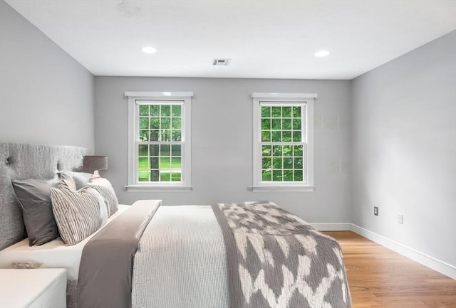 5 John Matthew Rd, Hopkinton, MA 01748 - bedroom with light wood-style flooring and recessed lighting