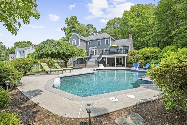 5 John Matthew Rd, Hopkinton, MA 01748 - swimming pool featuring stairs, a wooden deck, and a patio area