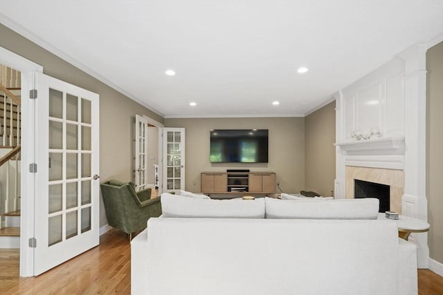 5 John Matthew Rd, Hopkinton, MA 01748 - living room with light wood-style floors, recessed lighting, a high end fireplace, ornamental molding, and stairs
