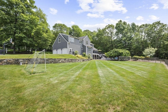 5 John Matthew Rd, Hopkinton, MA 01748 - view of yard featuring a garage and view of wooded area