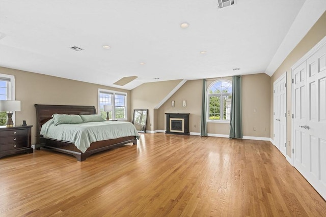 5 John Matthew Rd, Hopkinton, MA 01748 - bedroom with multiple windows, light wood-style floors, vaulted ceiling, and recessed lighting