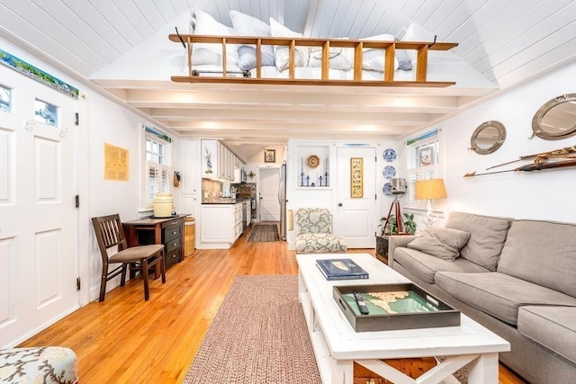 living area with wood ceiling, light wood-style flooring, and vaulted ceiling with beams