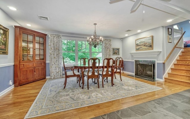 15 Blackburnian Rd, Lincoln, MA 01773 - dining space featuring stairs, baseboards, a chandelier, light wood finished floors, and recessed lighting