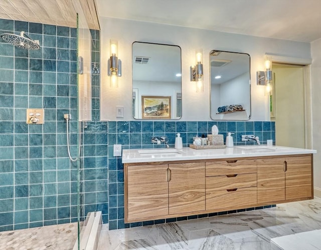15 Blackburnian Rd, Lincoln, MA 01773 - full bath with double vanity, a tile shower, tile walls, and marble finish flooring