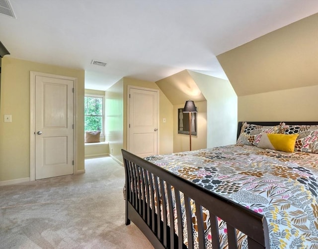 15 Blackburnian Rd, Lincoln, MA 01773 - bedroom with light carpet, baseboards, and lofted ceiling