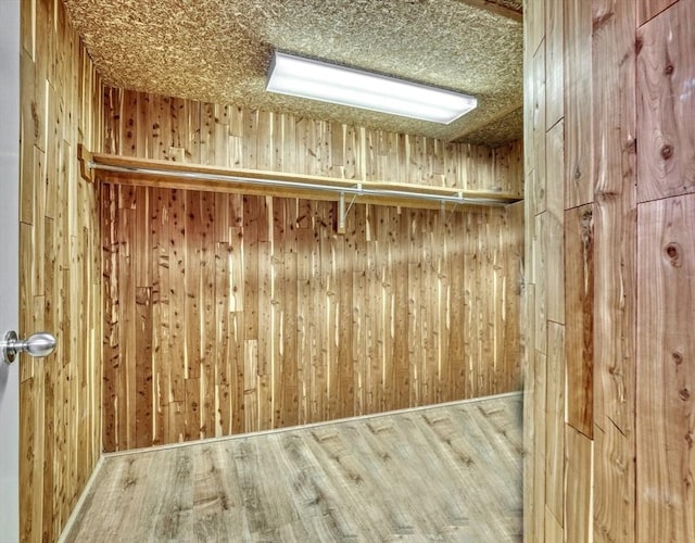15 Blackburnian Rd, Lincoln, MA 01773 - walk in closet featuring wood finished floors