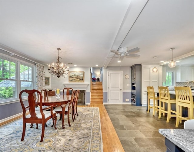 15 Blackburnian Rd, Lincoln, MA 01773 - dining room featuring baseboards, a chandelier, a ceiling fan, and recessed lighting