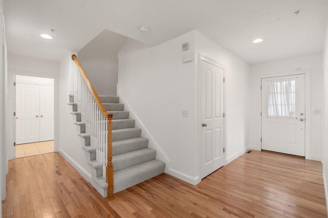 32 Old Framingham Rd Unit 20, Sudbury, MA 01776 - foyer with light wood-style floors, stairway, and recessed lighting