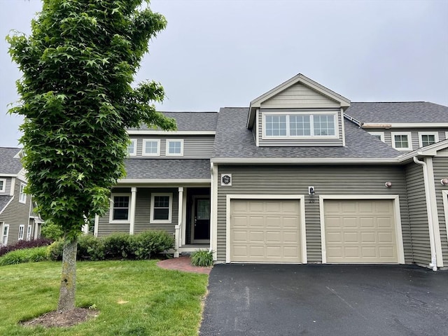 32 Old Framingham Rd Unit 20, Sudbury, MA 01776 - view of front of property with asphalt driveway, roof with shingles, a front lawn, and a garage