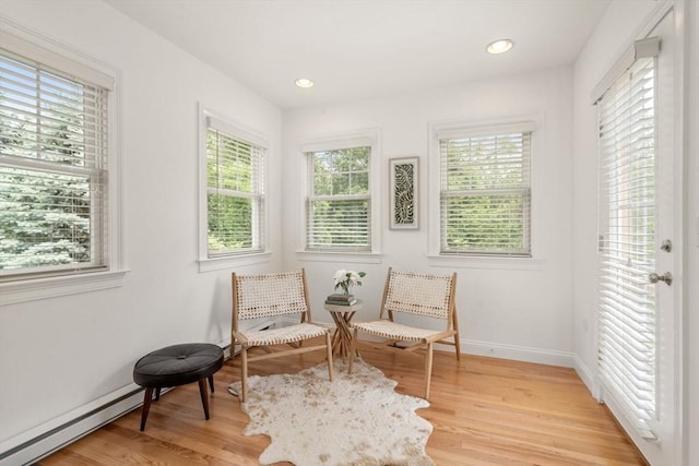 32 Old Framingham Rd Unit 20, Sudbury, MA 01776 - living area with a baseboard heating unit, healthy amount of natural light, light wood-style flooring, and recessed lighting