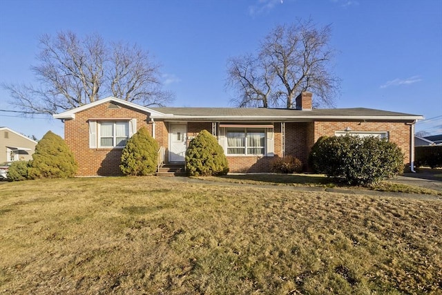 single story home with a front yard