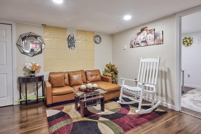 living room featuring recessed lighting, baseboards, and wood finished floors