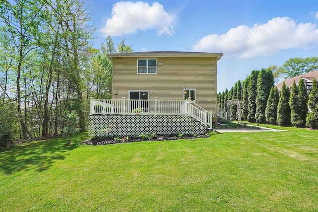 3 Birch Ave, East Longmeadow, MA 01028 - rear view of house featuring a deck and a lawn